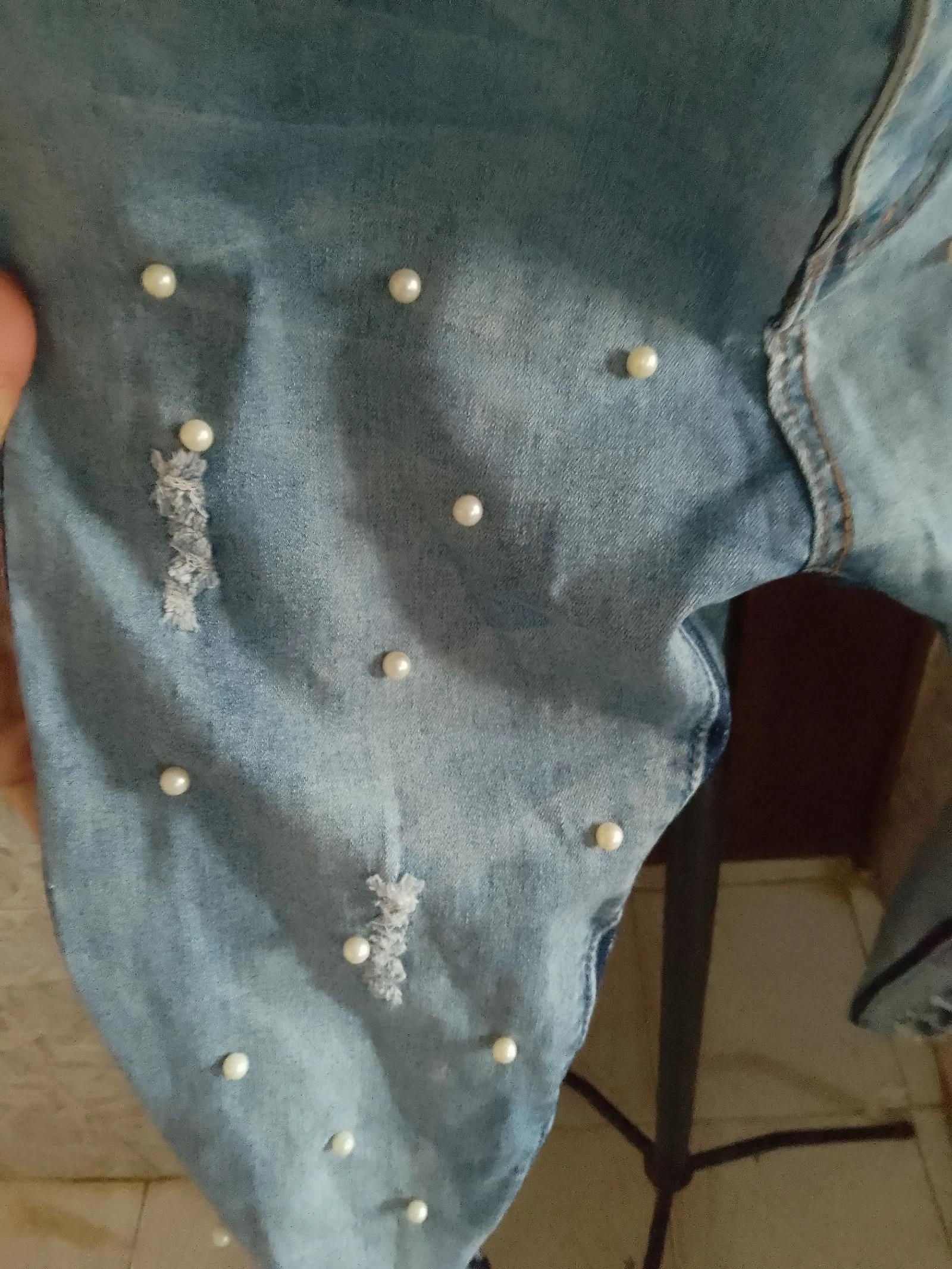 Denim pants with openings and balls – photo 3